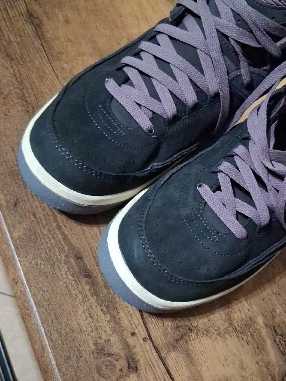 Jordan Men’s High-Top Sneakers in Black and Purple Accents